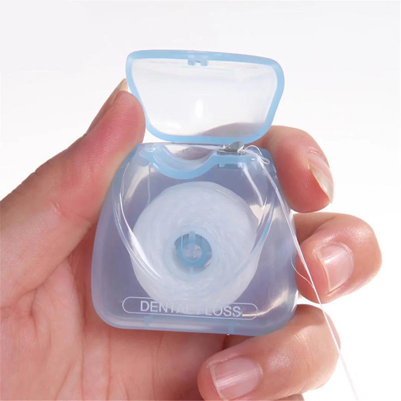 Dental Floss with Built‑In Cutter — Portable 50m Egg‑Shaped