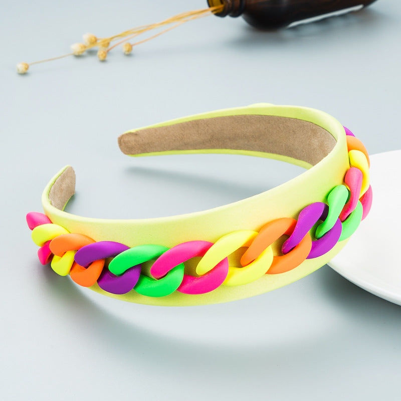 Wide-Brimmed Chain Headband for Playful Colorful Style
