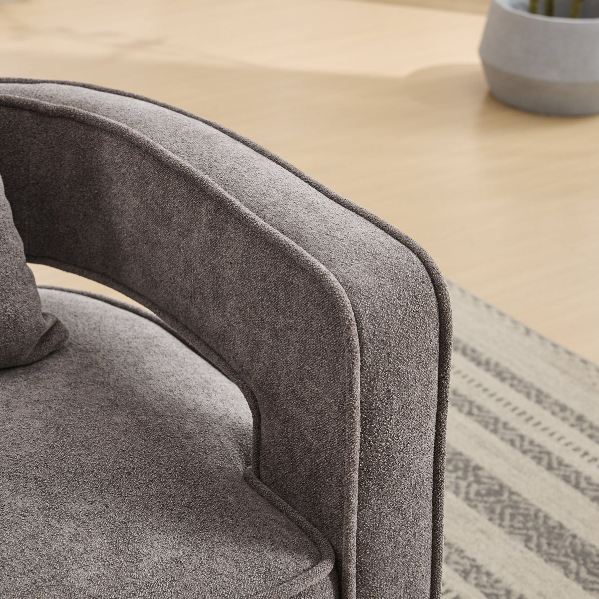 Modern Swivel Accent Chair with Open Back and Boucle Look