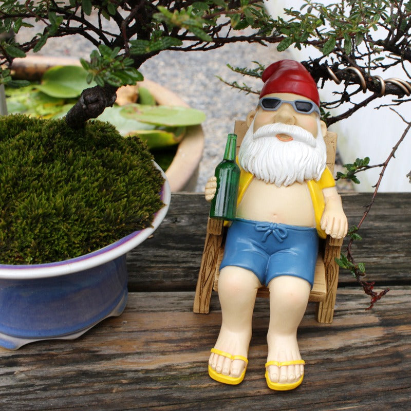 Funny Garden Gnome Figurine Relaxing in a Deck Chair