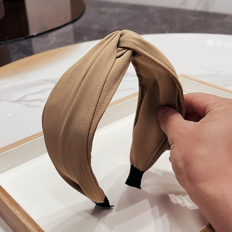 Fashionable Twisted Bow Headband for Polished Style
