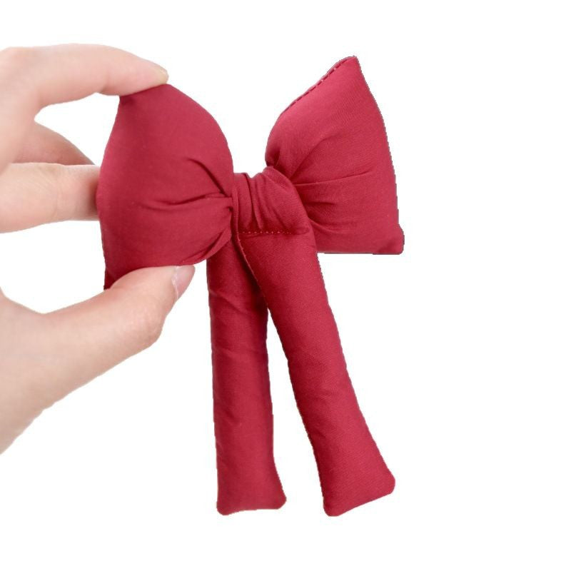 3D Padded Fabric Bows for Festive Gift Arrangements
