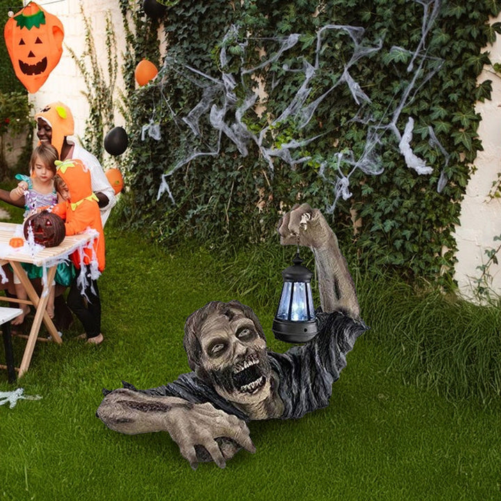 Zombie Lawn Statue with a Glowing Halloween Lantern