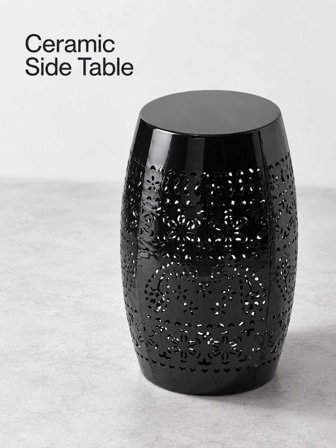 Black Ceramic Side Table with Floral Cutout Design