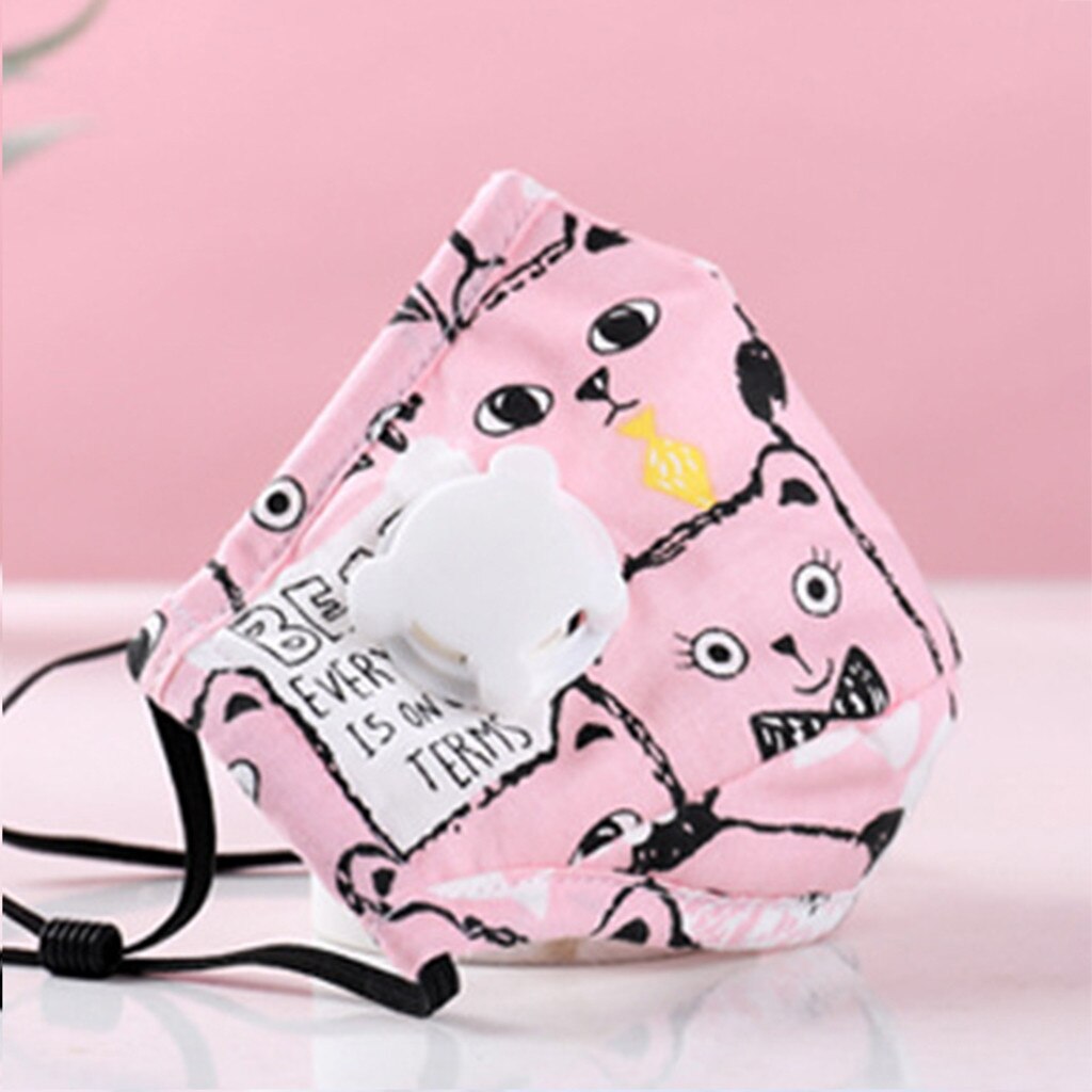 Close-up of pink cat mask with expressive eyes and yellow accent detail, white center panel visible