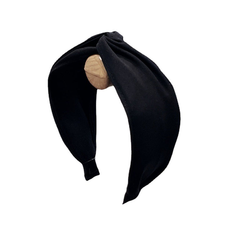 Fashionable Twisted Bow Headband for Polished Style