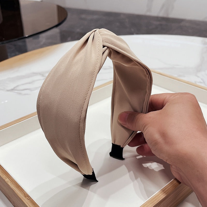 Fashionable Twisted Bow Headband for Polished Style