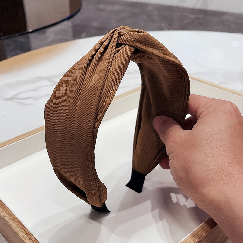 Fashionable Twisted Bow Headband for Polished Style