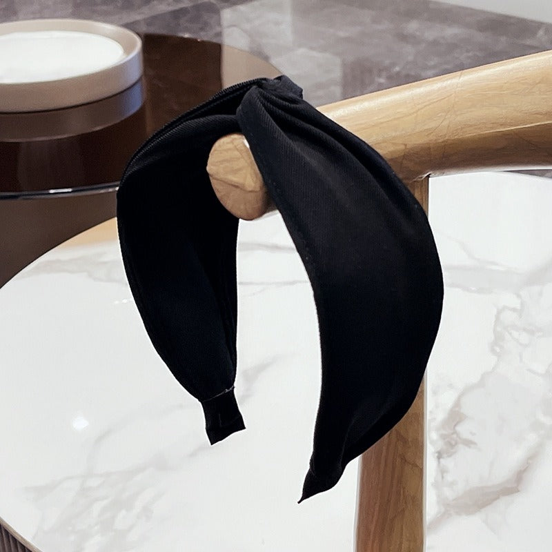 Fashionable Twisted Bow Headband for Polished Style