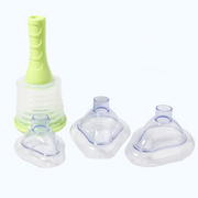 Complete respiratory device set with lime-green pump unit and three interchangeable clear silicone masks of varying anatomical shapes