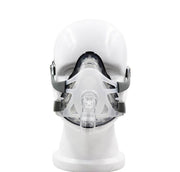 Front-facing full CPAP mask on mannequin head showing complete assembly
