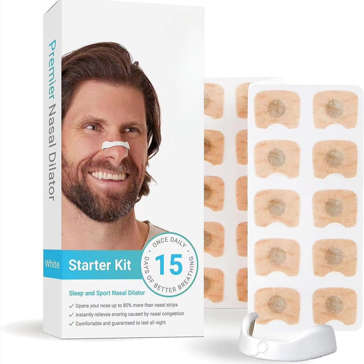 Bearded man smiling with white nasal dilator on his nose, packaging box showing Premiet Nasal Dilator Starter Kit with teal accent band