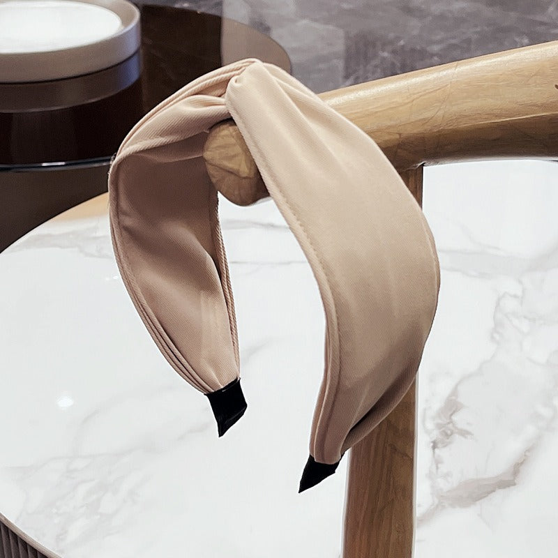 Fashionable Twisted Bow Headband for Polished Style
