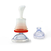 Full respiratory trainer system showing adult and pediatric masks side-by-side with color-coded sizing rings