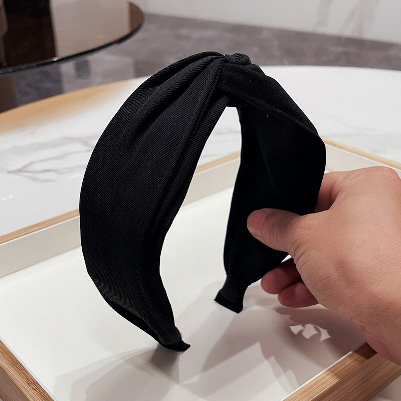 Fashionable Twisted Bow Headband for Polished Style