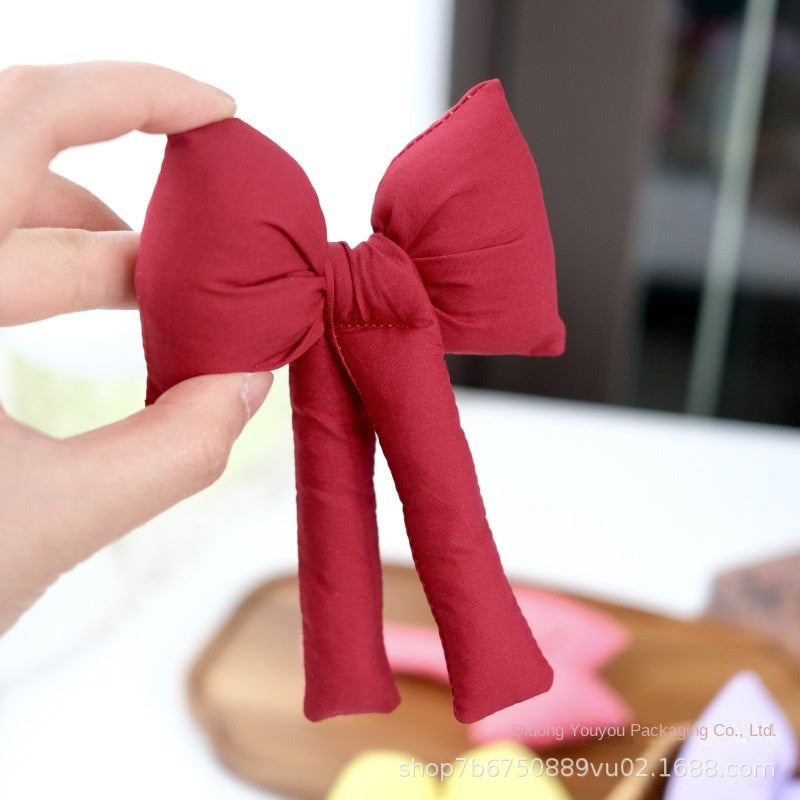 3D Padded Fabric Bows for Festive Gift Arrangements