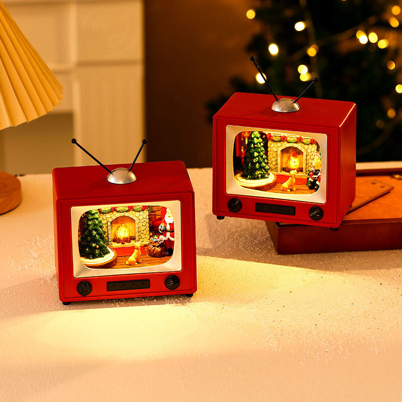 Christmas TV Ornament With Spinning Musical Display