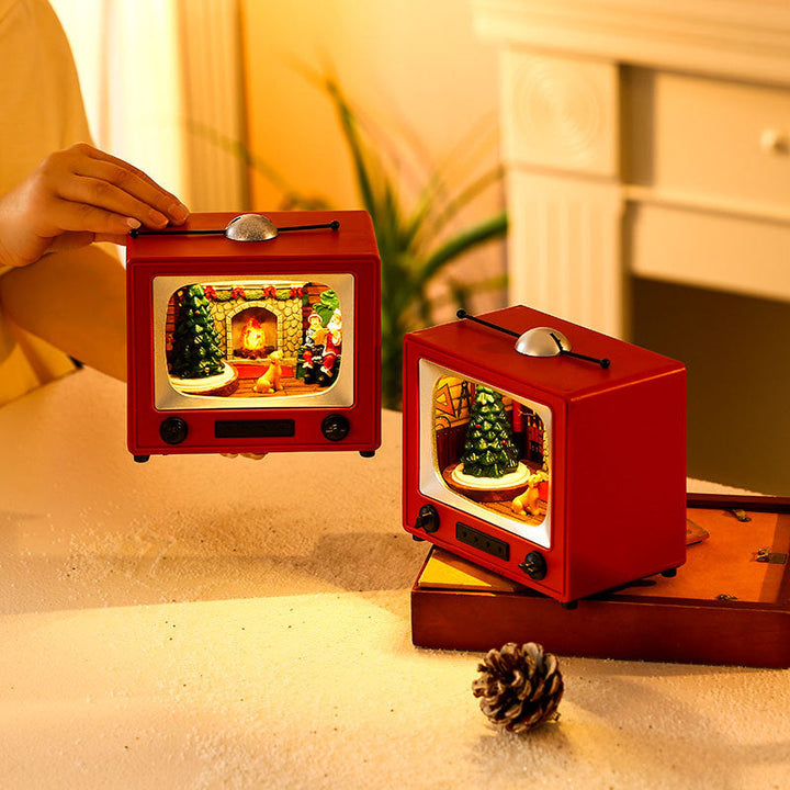 Christmas TV Ornament With Spinning Musical Display