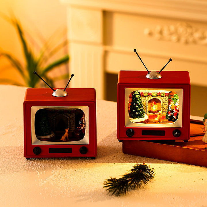 Christmas TV Ornament With Spinning Musical Display