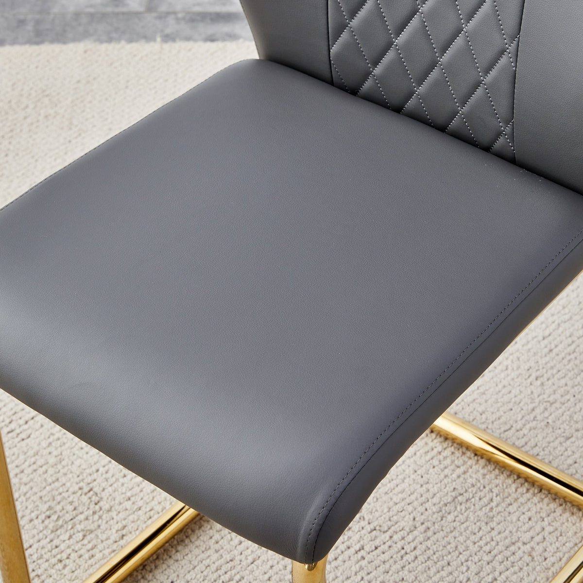 Gray Faux Leather Dining Chair with Gold Metal Legs