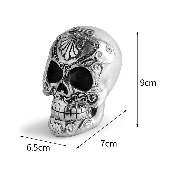 Gothic Skull Ornament with Dramatic Silver Detail