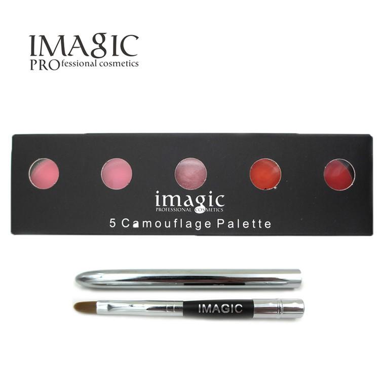 Model wearing bold red lip color from palette with professional styling in black and white outfit