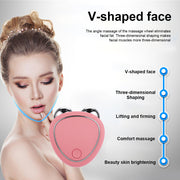 Woman demonstrating V-shaped face contouring with pink facial massage device showing lifting pathway along jawline