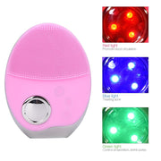 Pink oval sonic brush device with illuminated silicone bristle head shown with three close-up photos of active red, blue, and green LED lights
