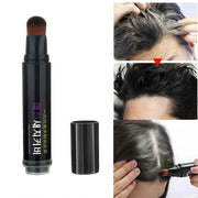 Product shot of black stick with purple branding, retractable brush applicator visible, cap removed