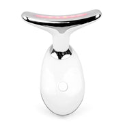White neck device with curved paddle head showing pink LED light activation and polished chrome accents with power button on handheld control