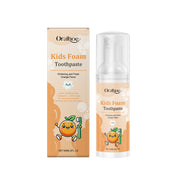 Product packaging and foam dispenser bottle side-by-side showing full branding, orange flavor claim, and cute tooth mascot