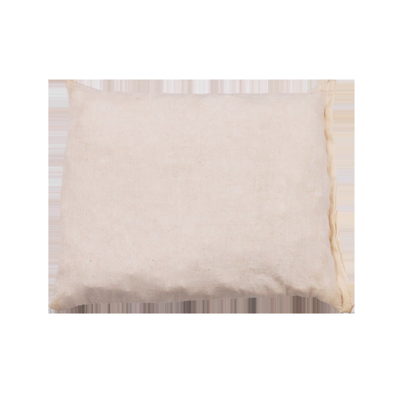 Cream linen reusable salt heating pack shown at 45-degree angle, displaying fabric texture and natural construction