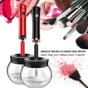 Electric makeup brush cleaner with red and black units spinning alongside collection of makeup brushes with colorful powder swatches and water bowl