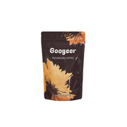 Googeer Mushroom Coffee pouch packaging—dark brown matte with gold sunflower botanical and white typography