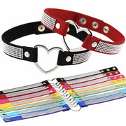 Black and red rhinestone heart choker necklaces displayed together above a flat-lay of all available color variants