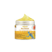 Wiyun Bee Venom Joints & Bone Care Cream jar front-facing on white background showing full packaging, golden peaked cream texture, honeycomb label design, and product claims