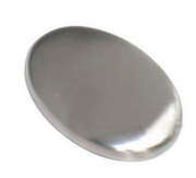 Polished stainless steel odor-removing soap bar on white background, angled to show smooth oval shape and metallic finish
