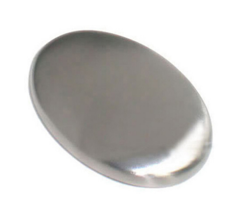 Polished stainless steel odor-removing soap bar on white background, angled to show smooth oval shape and metallic finish