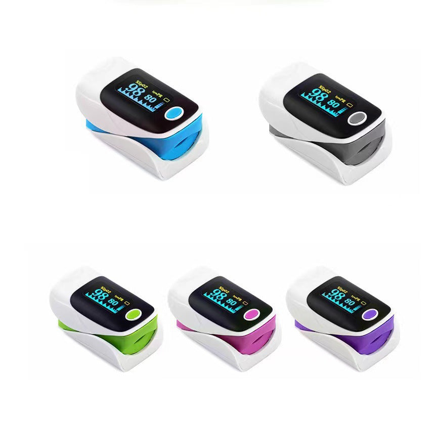 Five fingertip pulse oximeters displayed in vibrant color variants: blue, grey, green, magenta, and purple, showing product range and color options