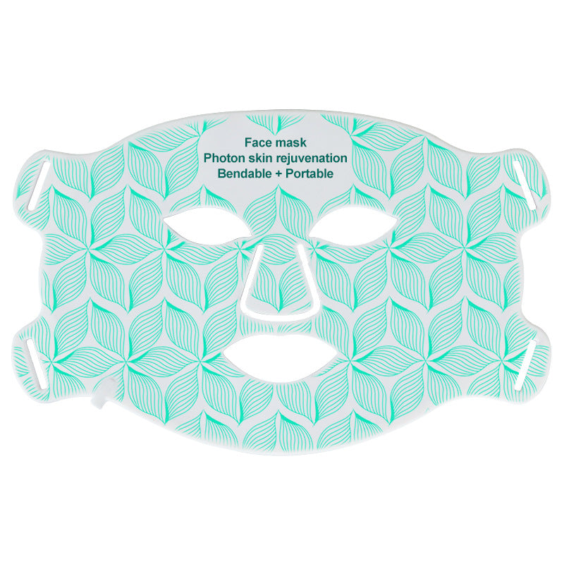 Turquoise silicone LED facial mask with geometric leaf pattern, displayed flat with product name and key benefits