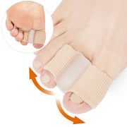 Hand holding foot with gel fiber toe splitter applied showing dual-hole design and toe separation correction with orange arrow indicating alignment action