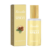 Roxelis Cedar Perfume Spray bottle and box side-by-side, pale yellow cylindrical glass bottle with wooden-grain textured spray cap and matching gold-hued packaging