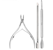 Three professional cuticle tools laid out: spring-loaded nipper on left, dual-ended cuticle pusher on right
