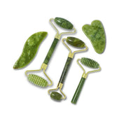 Complete jade massage tool set with 6 pieces arranged flat showing all interchangeable heads and handles in varying sizes