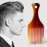 Tortoiseshell amber hair pick comb shown beside a man with a slicked-back pompadour hairstyle