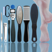 Complete 10-piece foot care kit laid out on blue background with all tools and accessories visible including rasps, clippers, roller, and case
