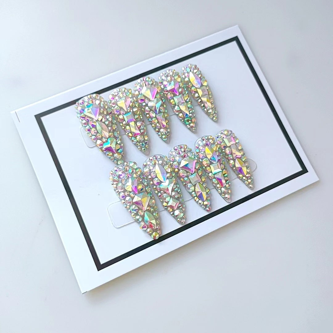 Identical display of 10 water-drop shaped nails showcasing gradient crystal coverage and holographic sparkle