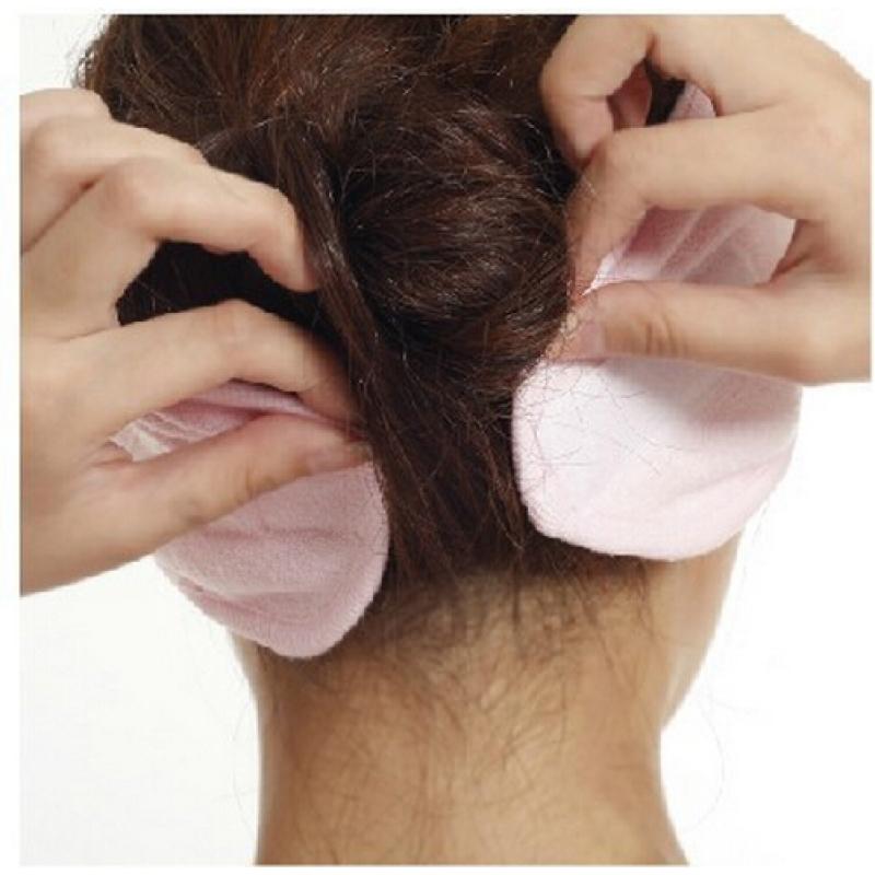 Blue headband laid flat on white background with color label