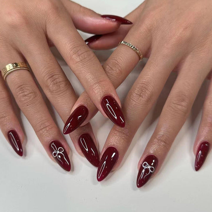 Long Almond Press-On Nails – Deep Red & Silver Bow Detail