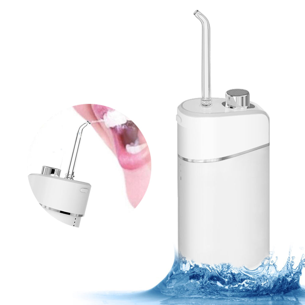 Two-tone navy and white water flosser with spray nozzle demonstrating water jet action and waterproof durability in water splash